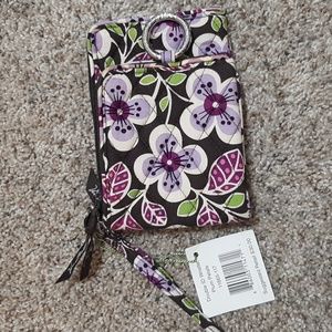 Wallet with wristlet for travel! Purple flower patterns with tags.